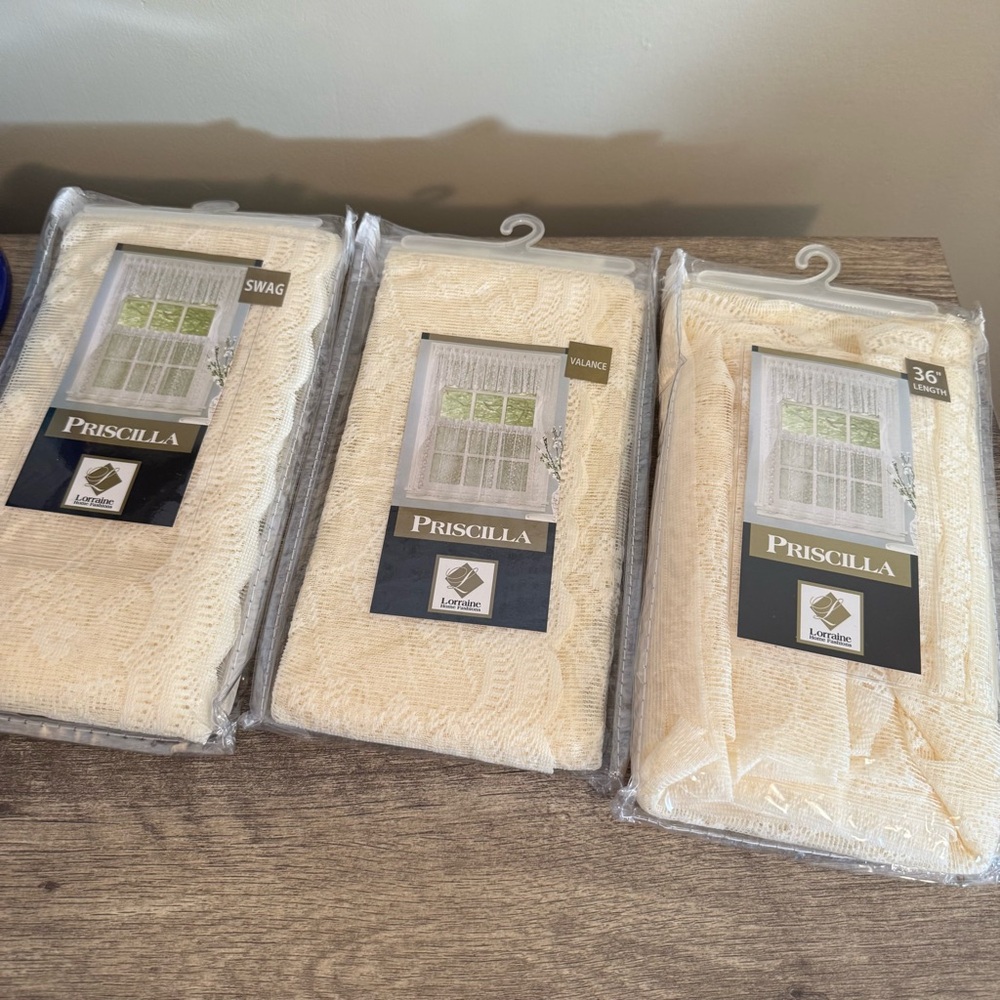 1 Window Curtain Set of Swag, Valance, and Tiered Curtains in the color Ivory